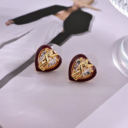 YSL 26S HEART CRYSTAL LOGO STUD EARRINGS IN RED ENAMEL AND GOLD TONE METAL 629854