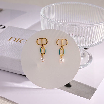 CD 26S LOGO ENAMEL LINK PEARL DROP EARRINGS IN GOLD METAL