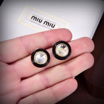 MIUMIU 26S ROUND CRYSTAL STUD EARRINGS IN BLACK RESIN AND GOLD TONE METAL 633262