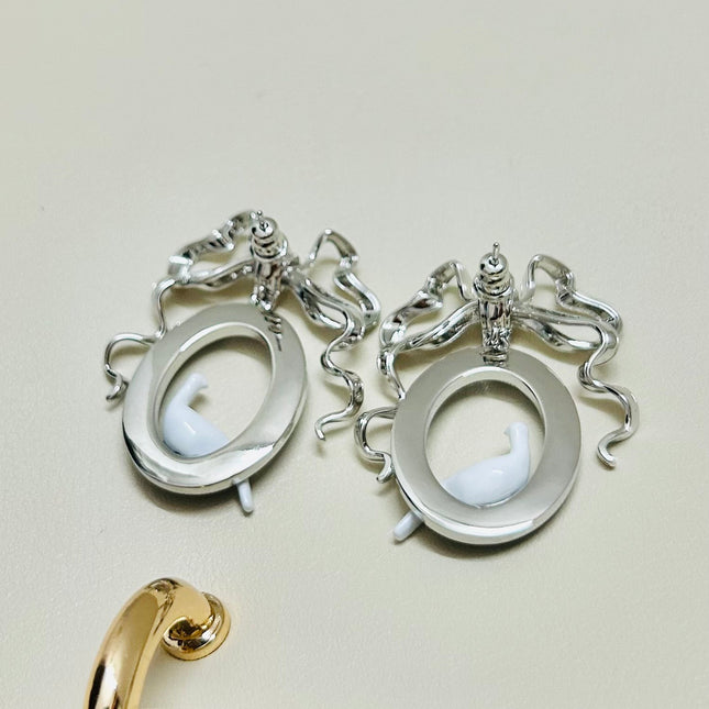 CD 26S TOILE DE JOUY BIRD BOW DROP EARRINGS IN SILVER TONE METAL 644371