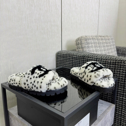 CHANEL 26S PLATFORM SLIDE SANDALS IN WHITE AND BLACK SHEARLING DALMATIAN PRINT