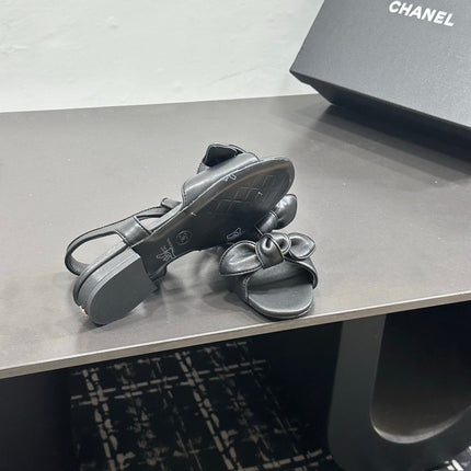 CHANEL 26S BOW SANDALS IN BLACK CALFSKIN