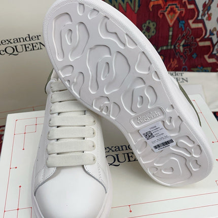 OVERSIZED SNEAKER IN WHITE CALFSKIN WITH EMBOSSED OLIVE GREEN HEEL TAB