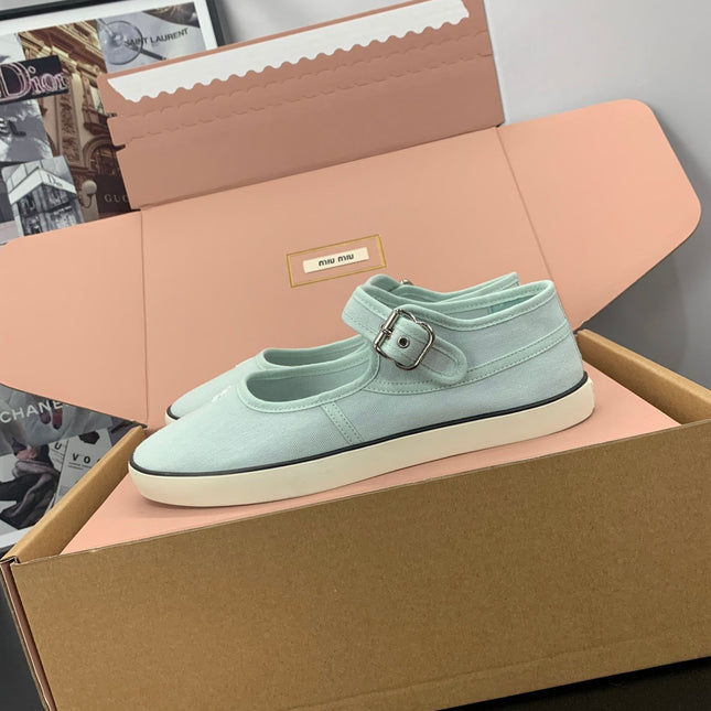 MIUMIU 26S MARY JANE FLATS IN PALE MINT CANVAS LOGO