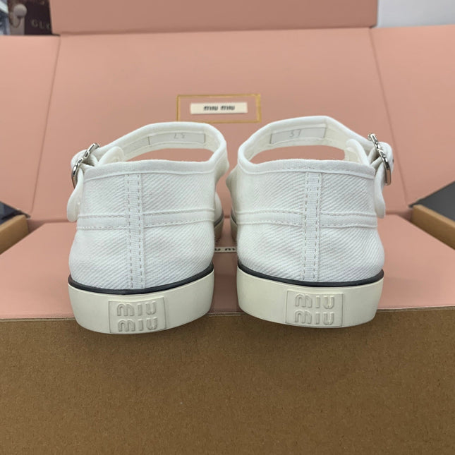 MIUMIU 26S MARY JANE FLATS IN WHITE CANVAS LOGO