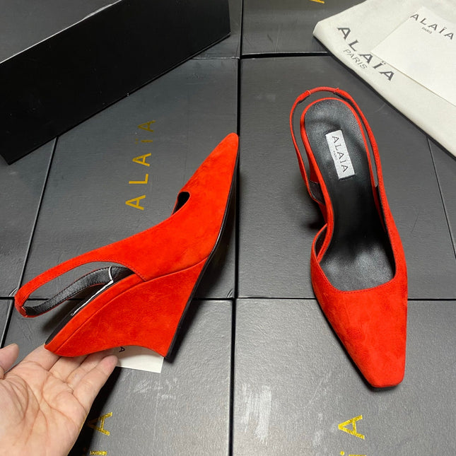 ALAIA 26S WEDGE SLINGBACKS 95 MM IN ORANGE RED SUEDE