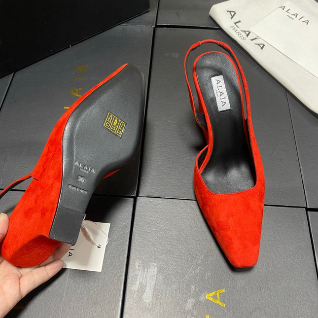 ALAIA 26S WEDGE SLINGBACKS 95 MM IN ORANGE RED SUEDE