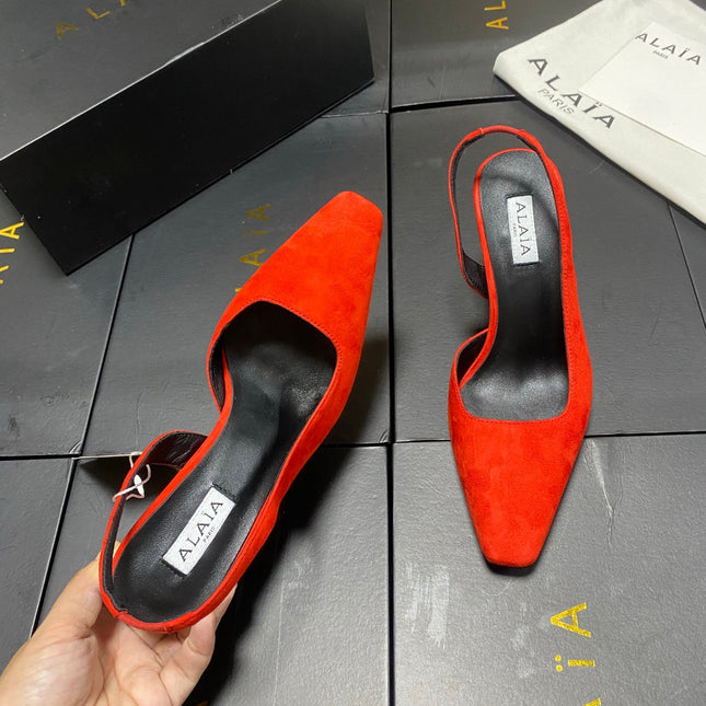 ALAIA 26S WEDGE SLINGBACKS 95 MM IN ORANGE RED SUEDE