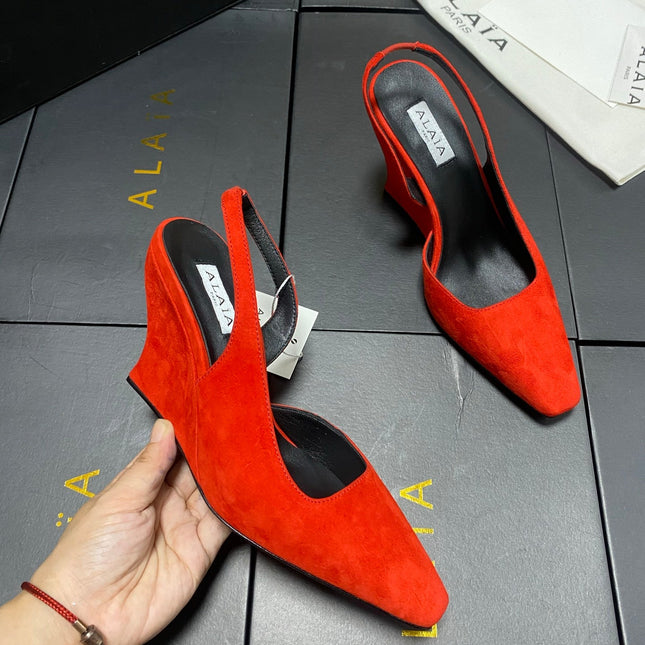 ALAIA 26S WEDGE SLINGBACKS 95 MM IN ORANGE RED SUEDE