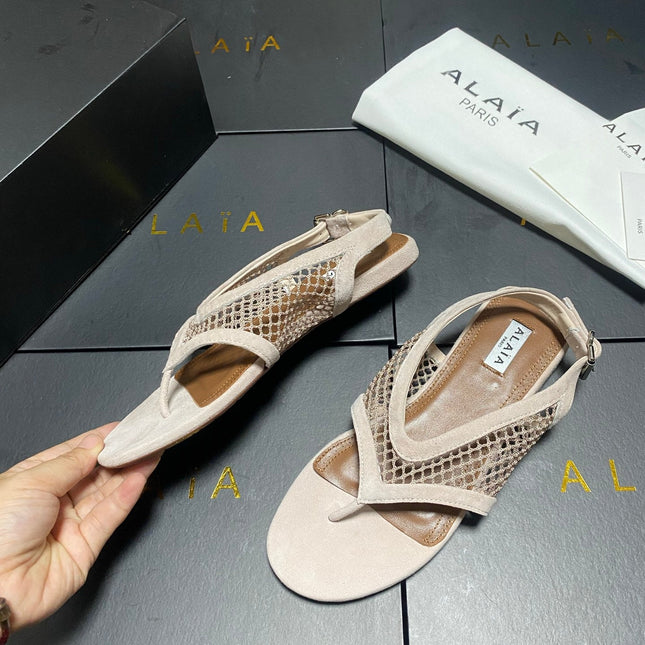 ALAIA 26S FLAT MESH THONG SANDALS IN BEIGE SUEDE