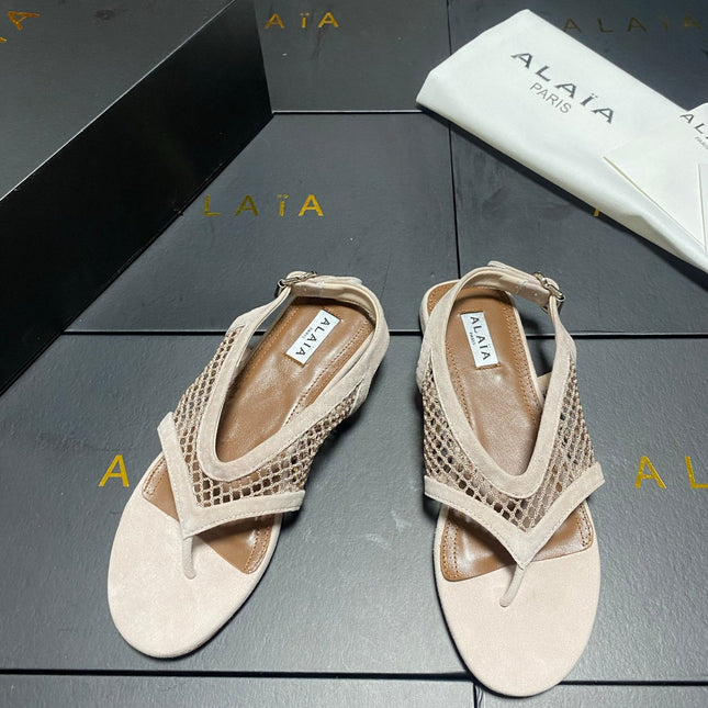 ALAIA 26S FLAT MESH THONG SANDALS IN BEIGE SUEDE