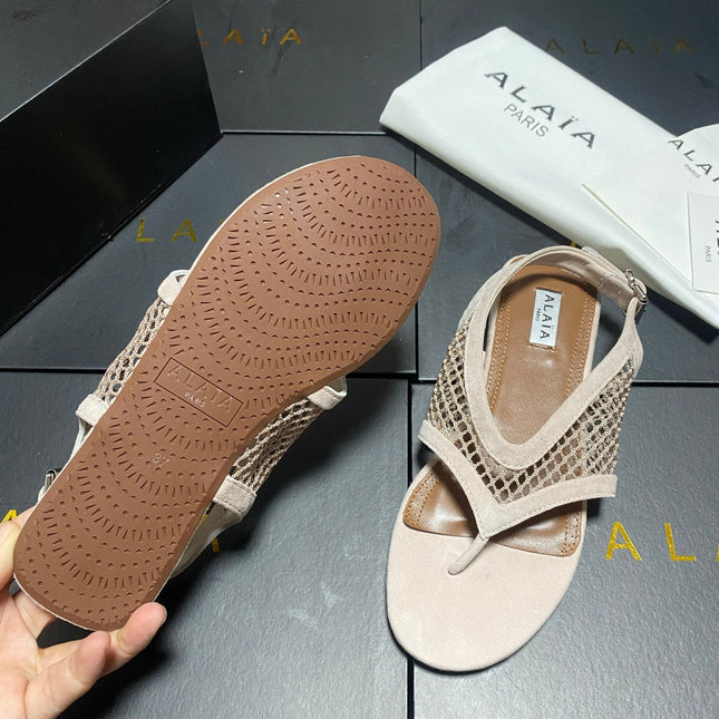 ALAIA 26S FLAT MESH THONG SANDALS IN BEIGE SUEDE