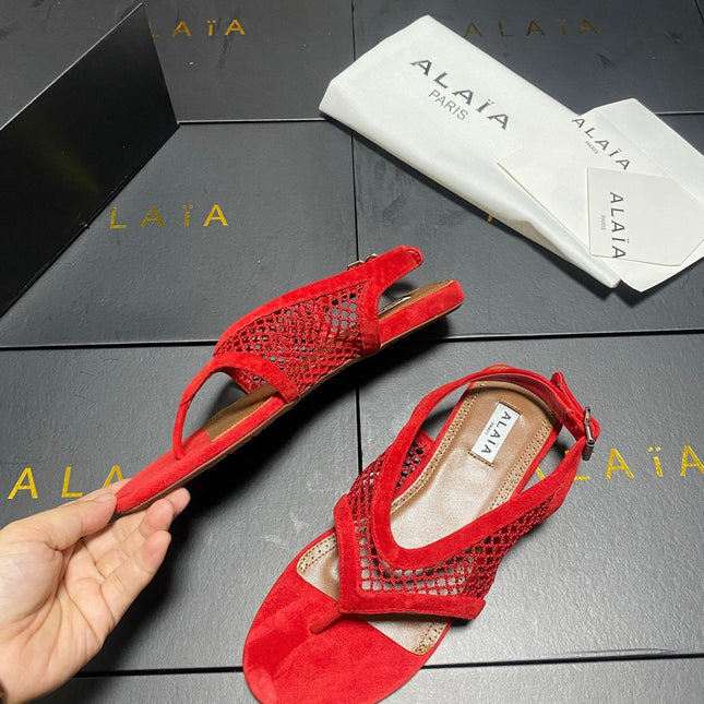 ALAIA 26S FLAT MESH THONG SANDALS IN RED SUEDE