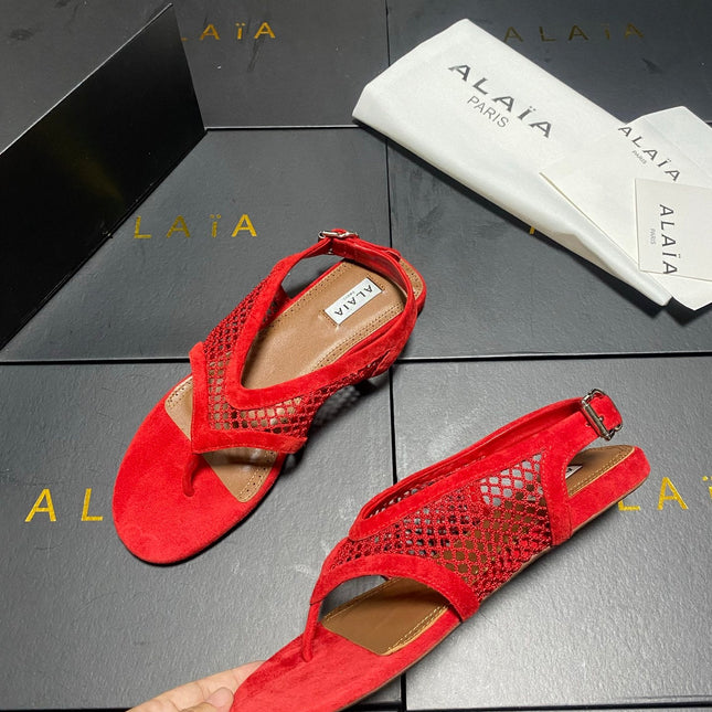ALAIA 26S FLAT MESH THONG SANDALS IN RED SUEDE