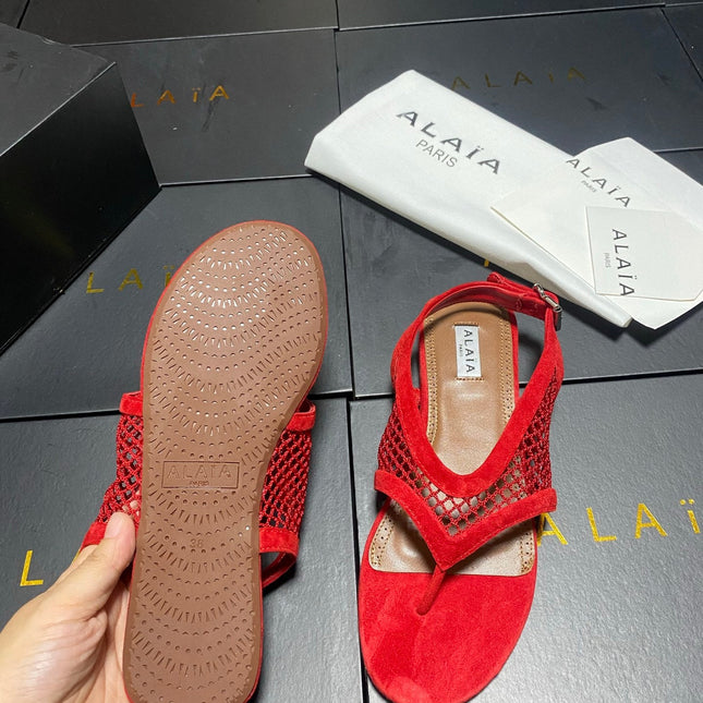 ALAIA 26S FLAT MESH THONG SANDALS IN RED SUEDE