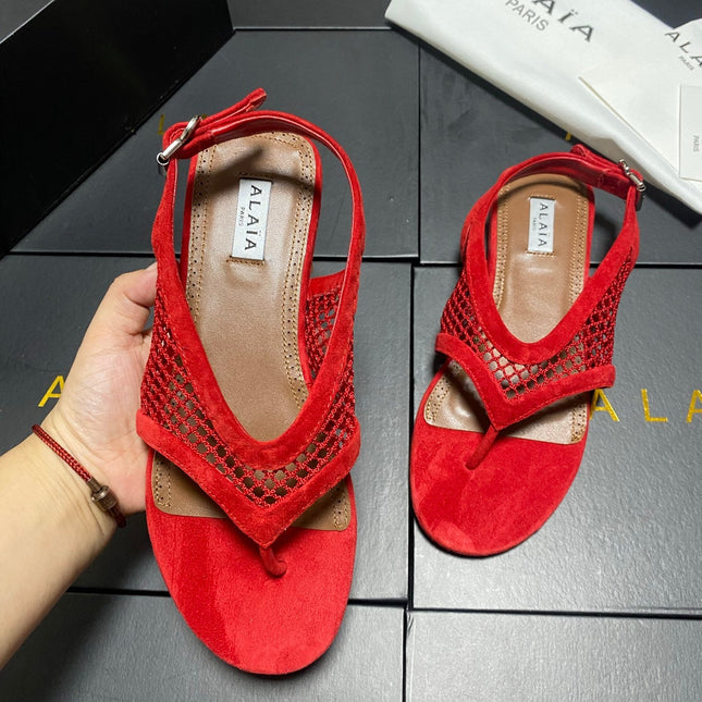 ALAIA 26S FLAT MESH THONG SANDALS IN RED SUEDE