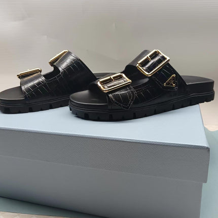 PRADA 26S STRAP SLIDES IN BLACK CROC EMBOSSED CALFSKIN GOLD HARDWARE