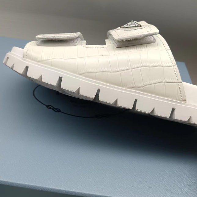 PRADA 26S STRAP SLIDES IN IVORY WHITE CROC EMBOSSED CALFSKIN