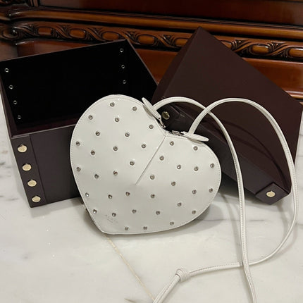 LE COEUR BAG 21 IN WHITE PATENT CALFSKIN ATTACHED STRASS