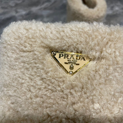 PRADA 26S ANKLE BOOTS IN BEIGE FUR