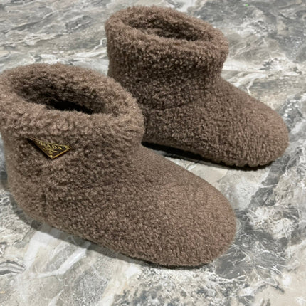 PRADA 26S ANKLE BOOTS IN DARK BROWN FUR