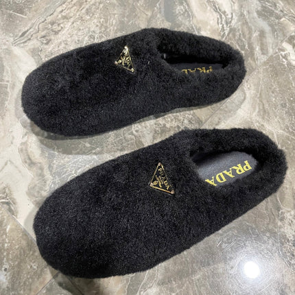 PRADA 26S SLIPPERS IN BLACK WOOL