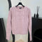 CHANEL SWEATERS