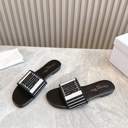 DIOR FLAT SLIDES 25S IN BLACK CALFSKIN AND FABRIC BRAND NAME EMBROIDERY