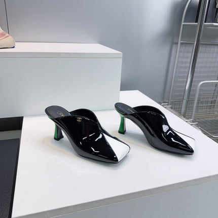 CHANEL 26S HIGH-HEEL MULES 70 MM IN BLACK AND WHITE LAMBSKIN