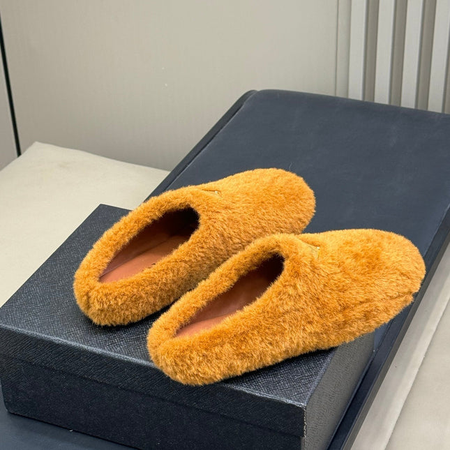 PRADA 25S CLOGS IN DARK ORANGE SHEARLING