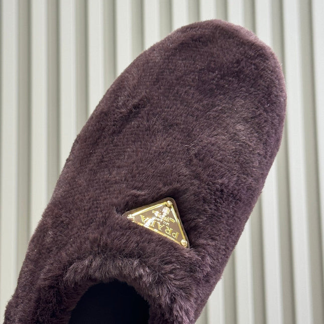 PRADA 25S CLOGS IN WINE RED SHEARLING