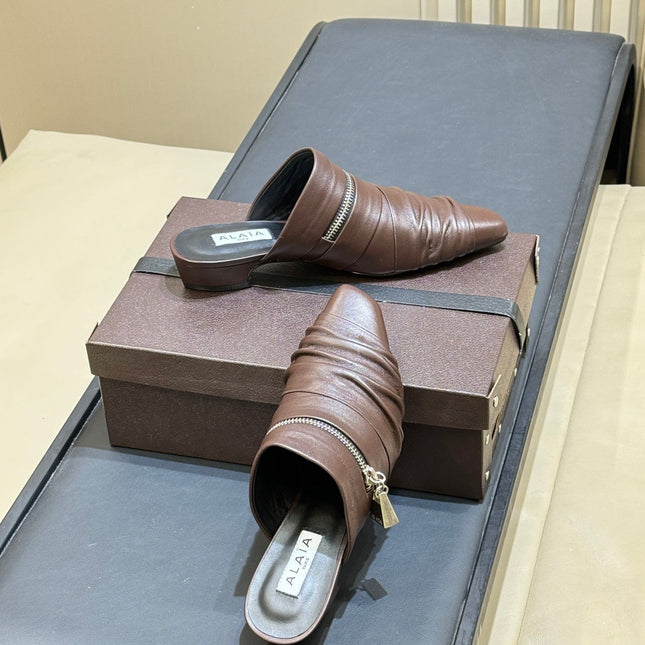 ALAIA 26S PLEATED MULES IN DARK BROWN LAMBSKIN
