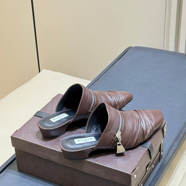 ALAIA 26S PLEATED MULES IN DARK BROWN LAMBSKIN