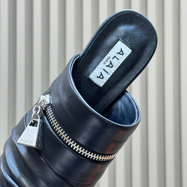 ALAIA 26S PLEATED MULES IN BLACK LAMBSKIN