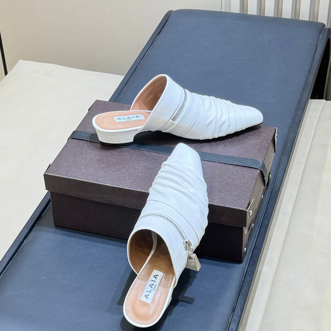 ALAIA 26S PLEATED MULES IN WHITE LAMBSKIN