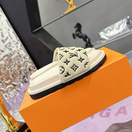 LV 26S POOL PILLOW SLIDES IN BEIGE BLACK MONOGRAM DENIM AND CALFSKIN