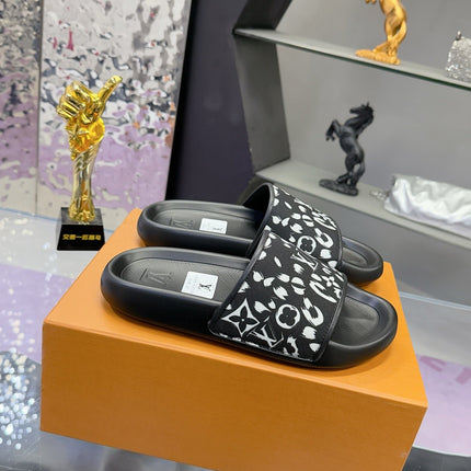 LV 26S SLIDE SANDALS IN BLACK WHITE CALFSKIN AND CANVAS