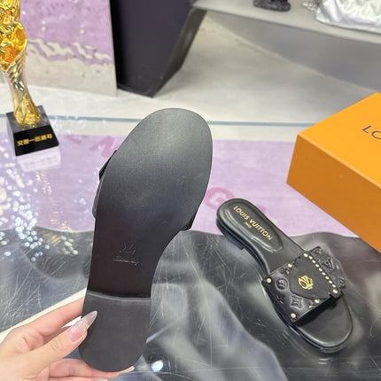 LV 26S FLAT SLIDE SANDALS IN BLACK EMBOSSED CALFSKIN GOLD HARDWARE