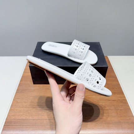ALAIA FLAT SANDALS WITH PERFORATED STRAPS 25S IN WHITE LAMBSKIN