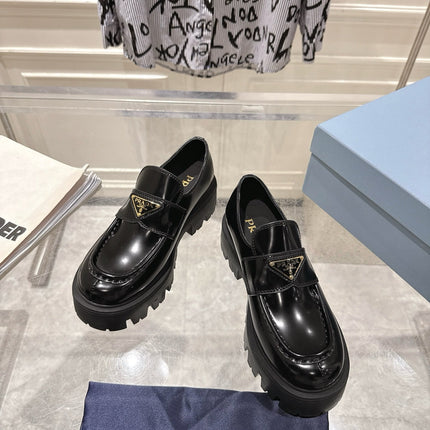 PRADA 26S PLATFORM LOAFERS 45MM IN BLACK SHINE CALFSKIN