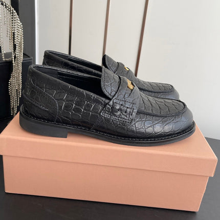 MIUMIU 26S PENNY LOAFERS IN BLACK CALFSKIN CROCODILE EMBOSSING
