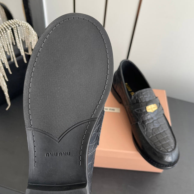 MIUMIU 26S PENNY LOAFERS IN BLACK CALFSKIN CROCODILE EMBOSSING