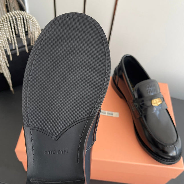 MIUMIU 26S PENNY LOAFERS IN BLACK GLOSSY CALFSKIN GOLD HARDWARE