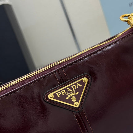 PRADA 25S RE-EDITION 2002 MEDIUM SHOULDER BAG 26 IN BURGUNDY CALFSKIN GOLD HARDWARE