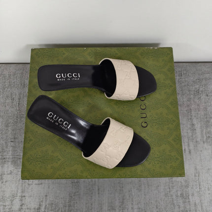 GUCCI 26S MULE SANDALS 55MM IN IVORY WHITE CALFSKIN GG EMBOSSED