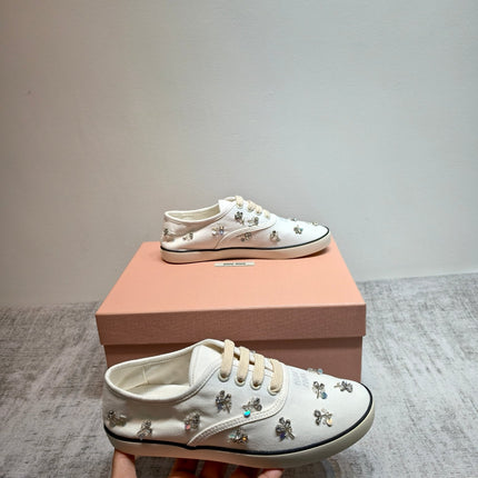 MIUMIU 26S LOW TOP SNEAKERS IN WHITE CANVAS CRYSTAL-EMBELLISHED