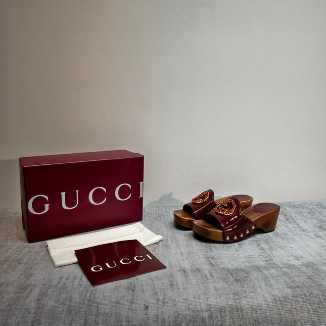 GUCCI 26S PLATFORM MULES IN BURGUNDY RED PATENT CALFSKIN GOLD HARDWARE