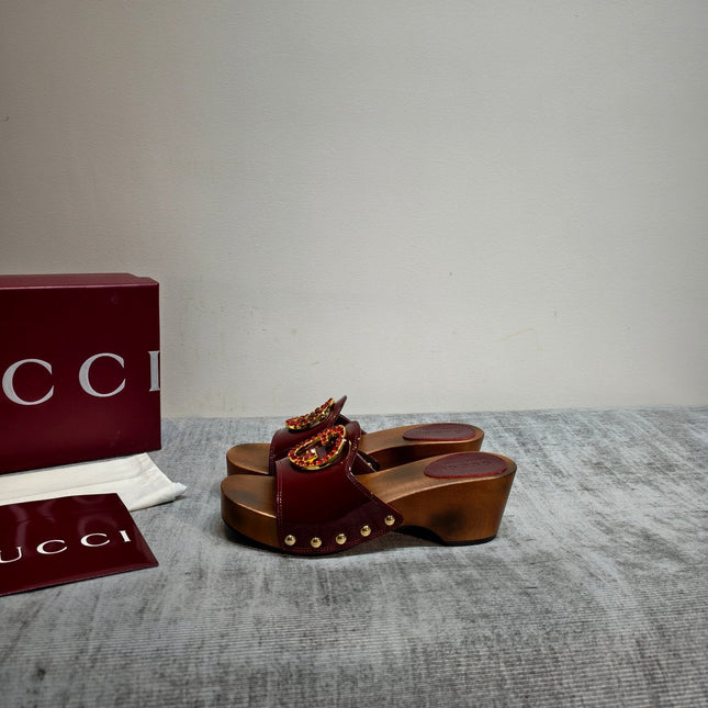 GUCCI 26S PLATFORM MULES IN BURGUNDY RED PATENT CALFSKIN GOLD HARDWARE