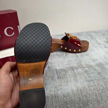GUCCI 26S PLATFORM MULES IN BURGUNDY RED PATENT CALFSKIN GOLD HARDWARE