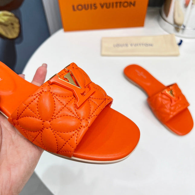 LV 26S MARE FLAT MULES IN ORANGE CALFSKIN